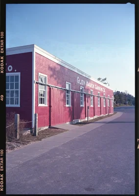 red canning company building with sliding doors