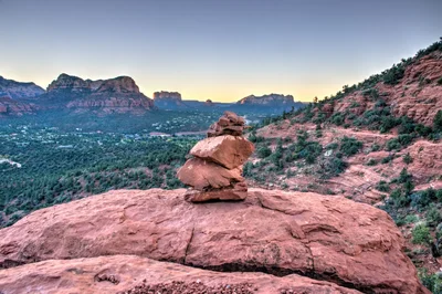 stacked rocks overlooking sedona red rock formations