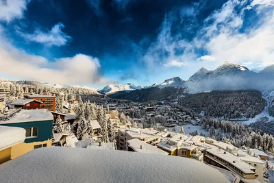 alpine resort town with snowy mountains