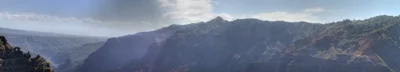 misty mountain range with layered ridges