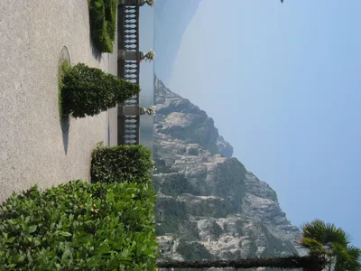 mediterranean coastal pathway with dramatic cliff backdrop